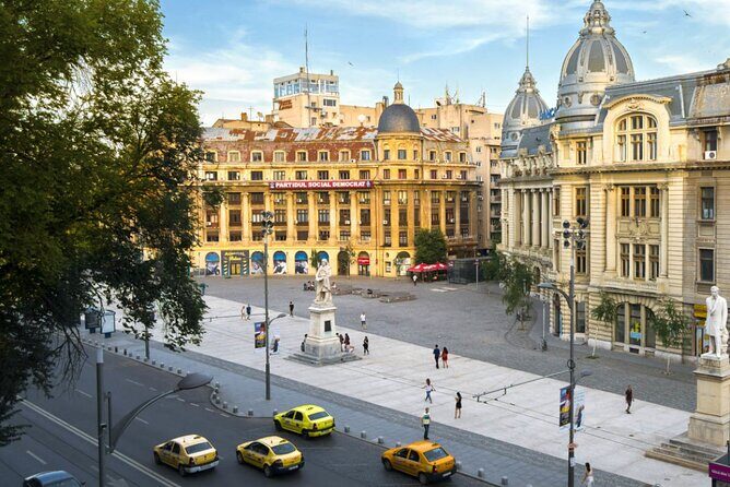Best Walking Tour of Bucharest's City Center - 2.5 hours - Memorialul Renașterii in Revolution Square: The Potato Obelisk and December 1989