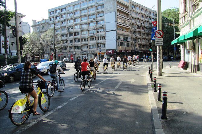 Bicycle Sightseeing in Bucharest - Piaka Revolukiei (Revolution Square): the mood shifts fast