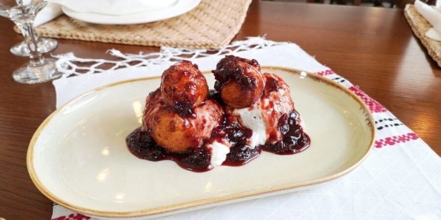 Bucharest: Street Food Tour with a Local Guide - Ending with hot papanasi: jam, cream, and comfort-food payback