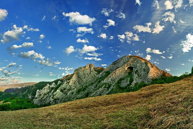 Discover Apuseni Mountains - Scarita Summit,Sipote Waterfall and Dumesti Village - The Scarita-Belioara trek: beech forest up to pale calcareous cliffs