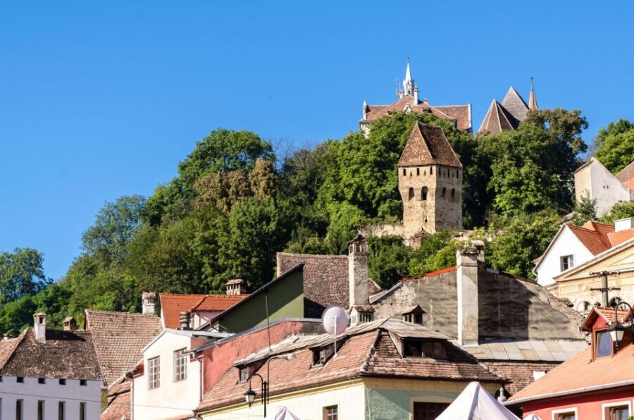 Sighisoara: Candlelight Tour of Dracula's Home Town - Up the Covered Stairs or Stairs of the Scholars to the Church on the Hill